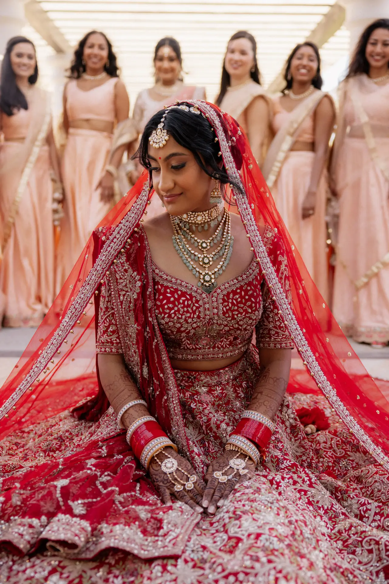 Bride in traditional red wedding attire. photo taken by Ximena Zermeño Global Luxury Destination Wedding Photographer, ximenazermeno.com