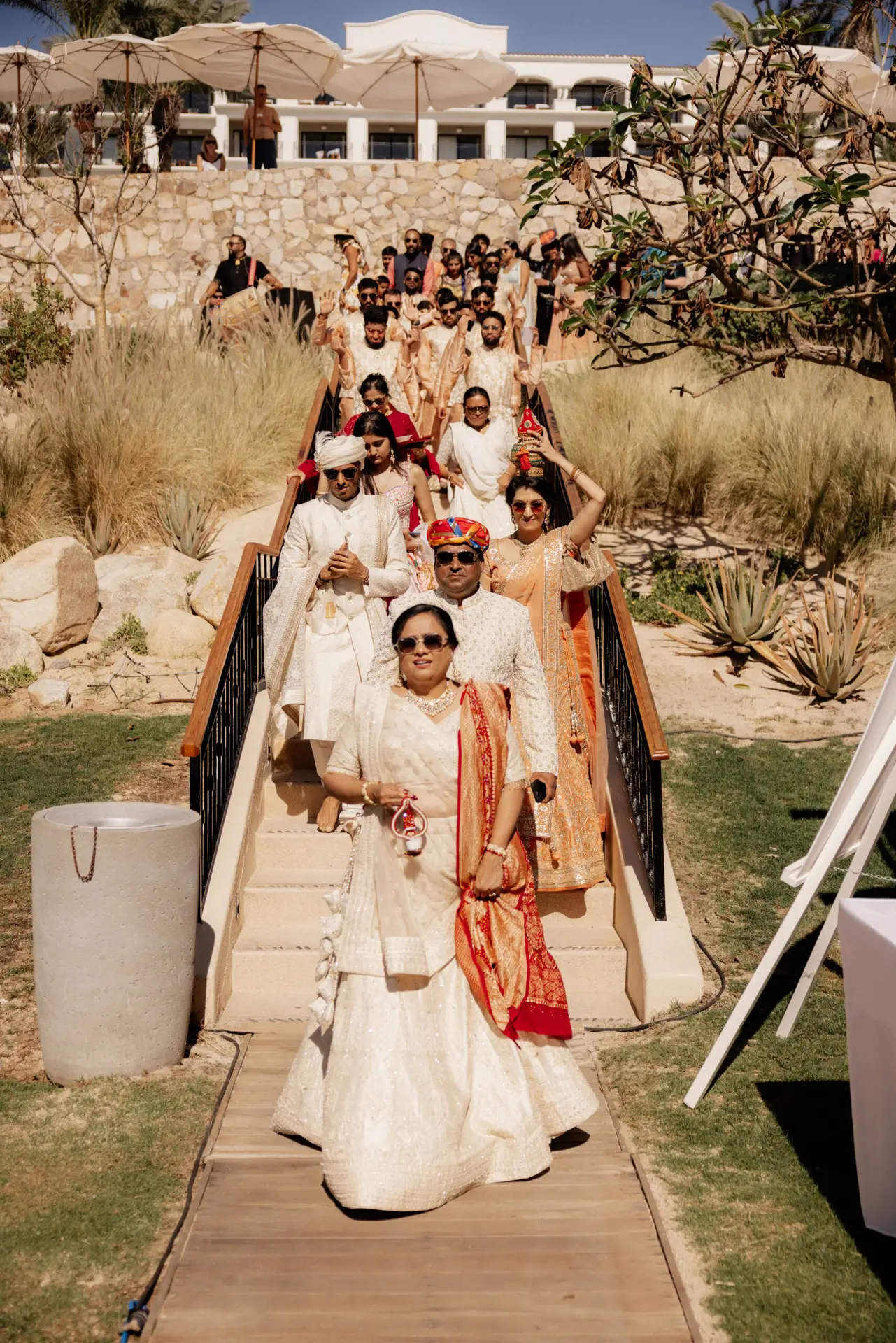 Wedding procession on scenic staircase. photo taken by Ximena Zermeño Global Luxury Destination Wedding Photographer, ximenazermeno.com