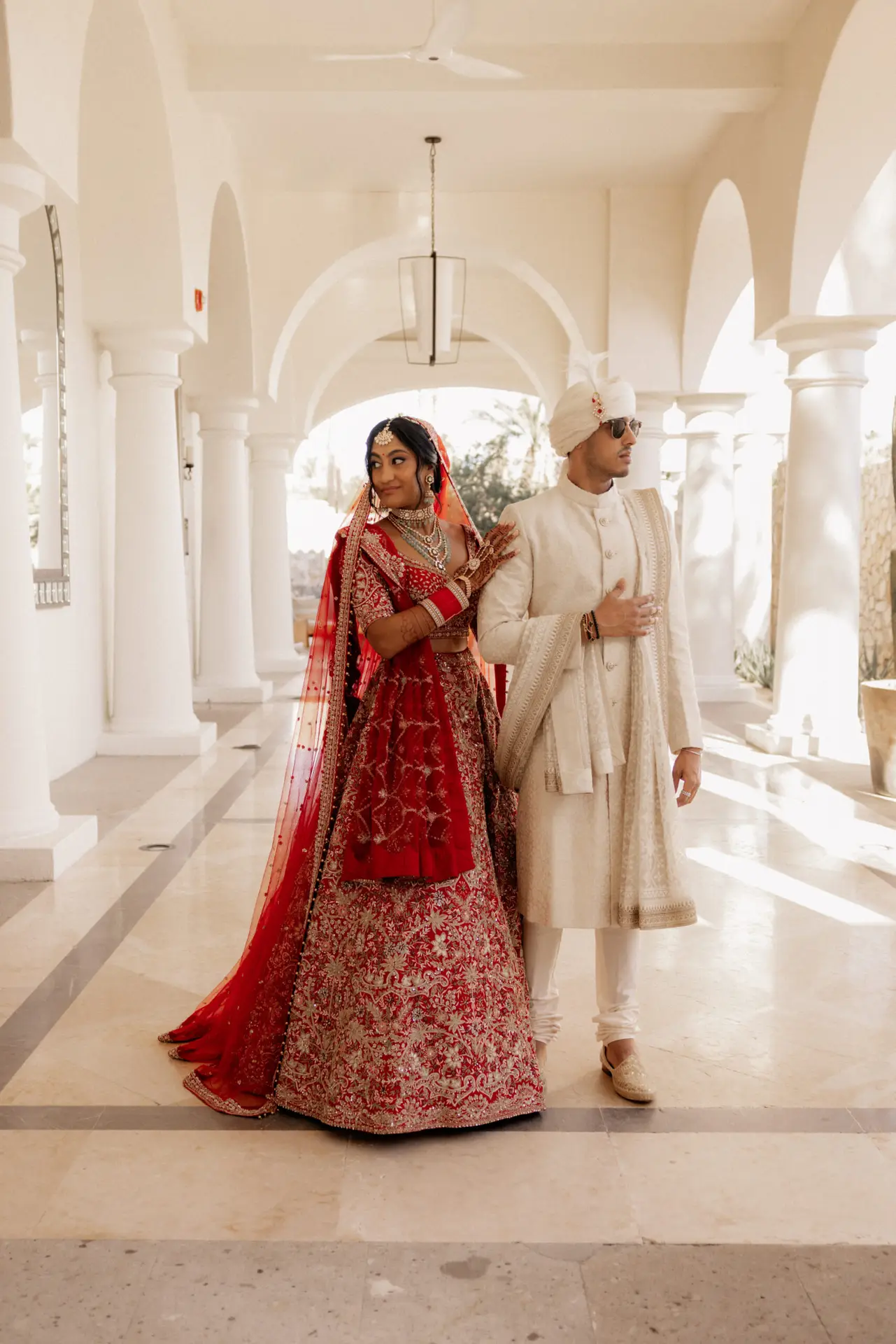 Bride and groom in traditional attire. photo taken by Ximena Zermeño Global Luxury Destination Wedding Photographer, ximenazermeno.com