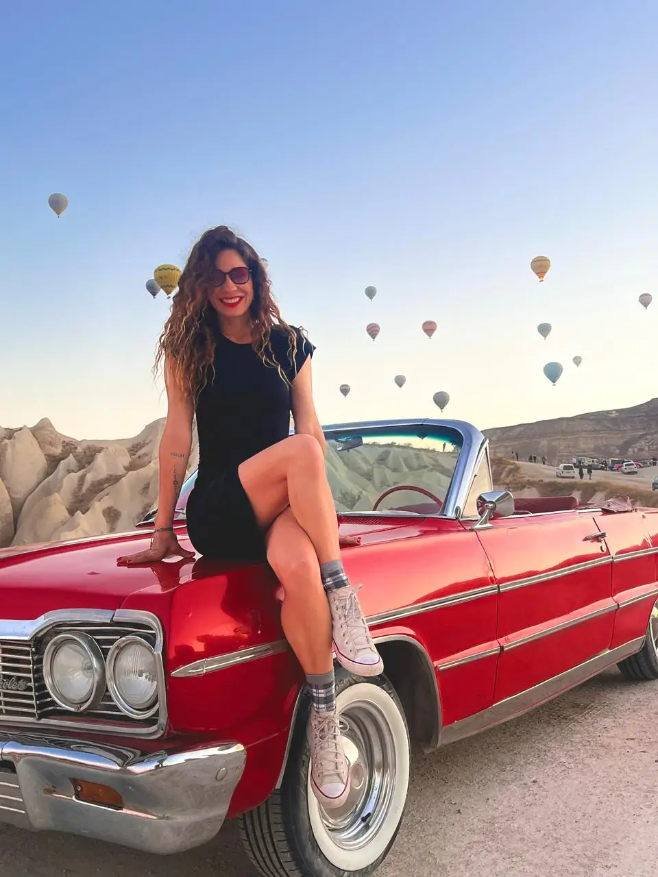 Xime in a red car | Photo by Ximena Zermeño