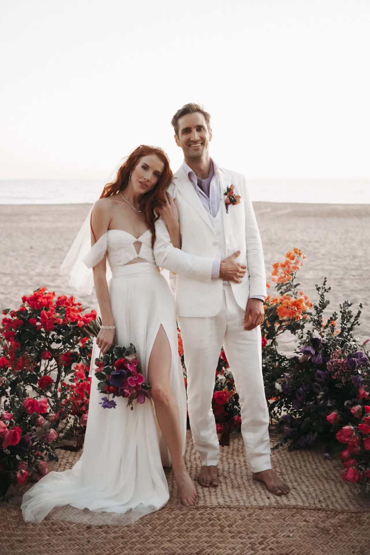 Beach wedding with floral decorations. photo taken by Ximena Zermeño Global Luxury Destination Wedding Photographer, ximenazermeno.com
