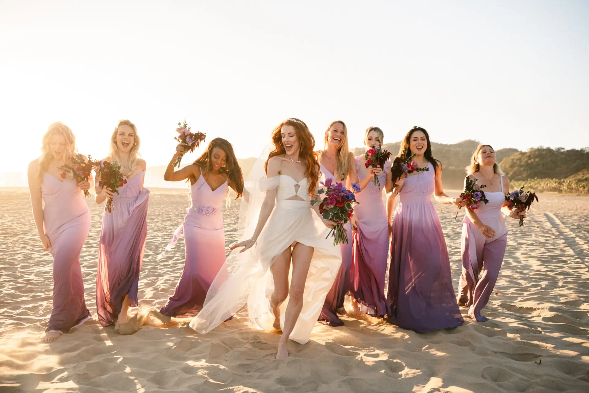 Bridal party on the beach at sunset. photo taken by Ximena Zermeño Global Luxury Destination Wedding Photographer, ximenazermeno.com