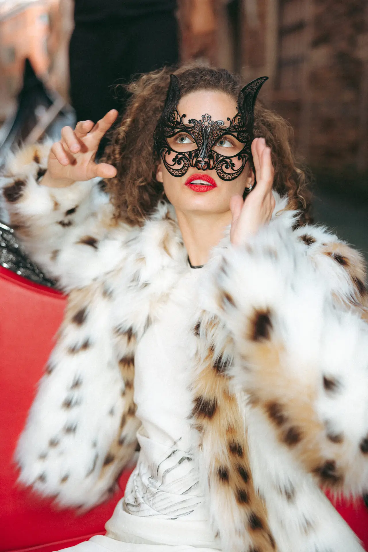 Model in Italy seated on a sandolo Photo taken by Ximena Zermeño Global Luxury Destination Wedding Photographer, ximenazermeno.com