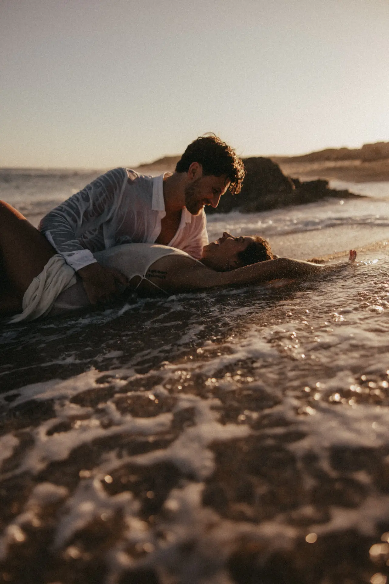 Couple at the beach photo taken by Ximena Zermeño Global Luxury Destination Wedding Photographer, ximenazermeno.com