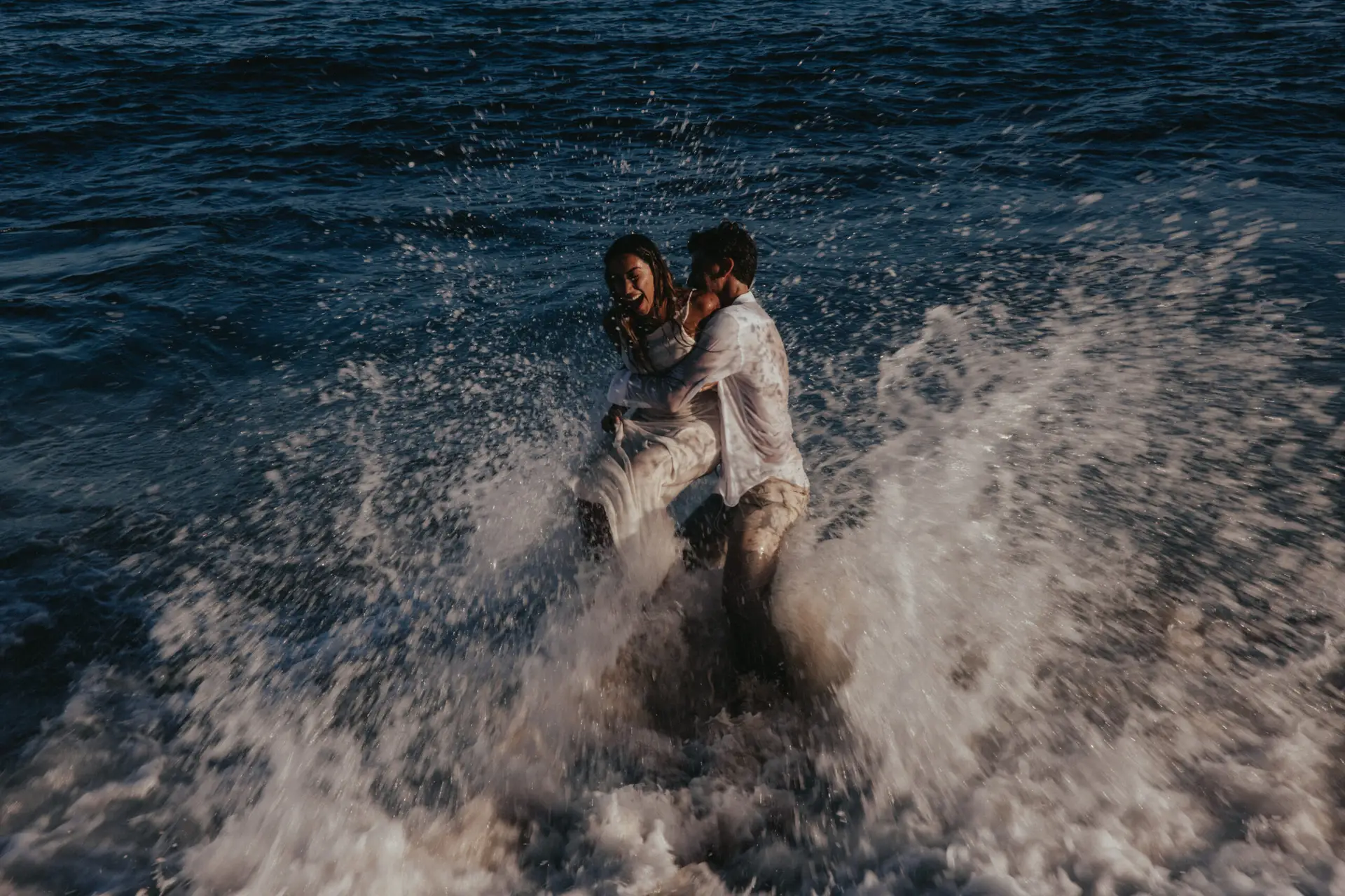 Couple enjoying the the beach photo taken by Ximena Zermeño Global Luxury Destination Wedding Photographer, ximenazermeno.com