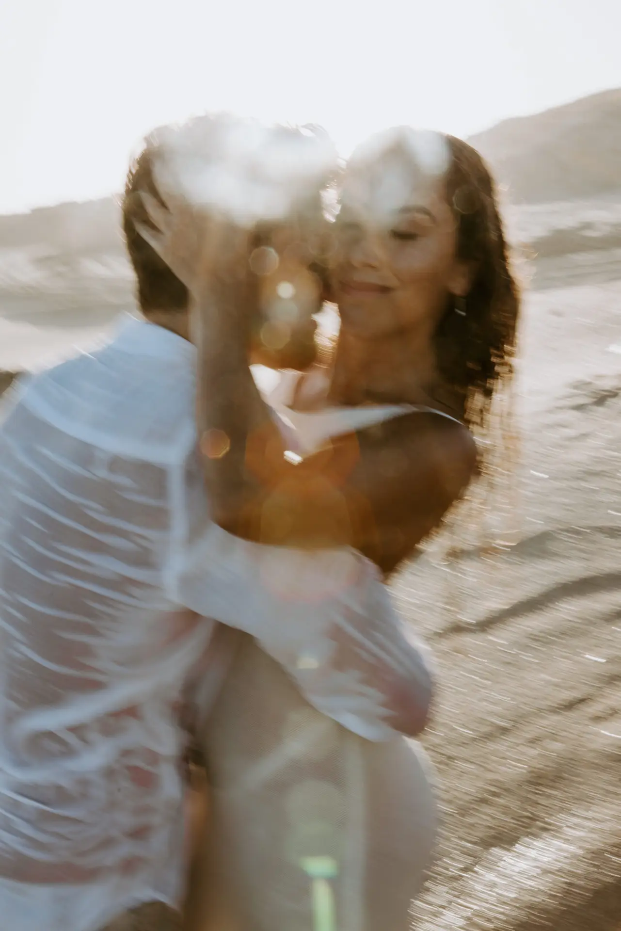Couple in love at the beach photo taken by Ximena Zermeño Global Luxury Destination Wedding Photographer, ximenazermeno.com