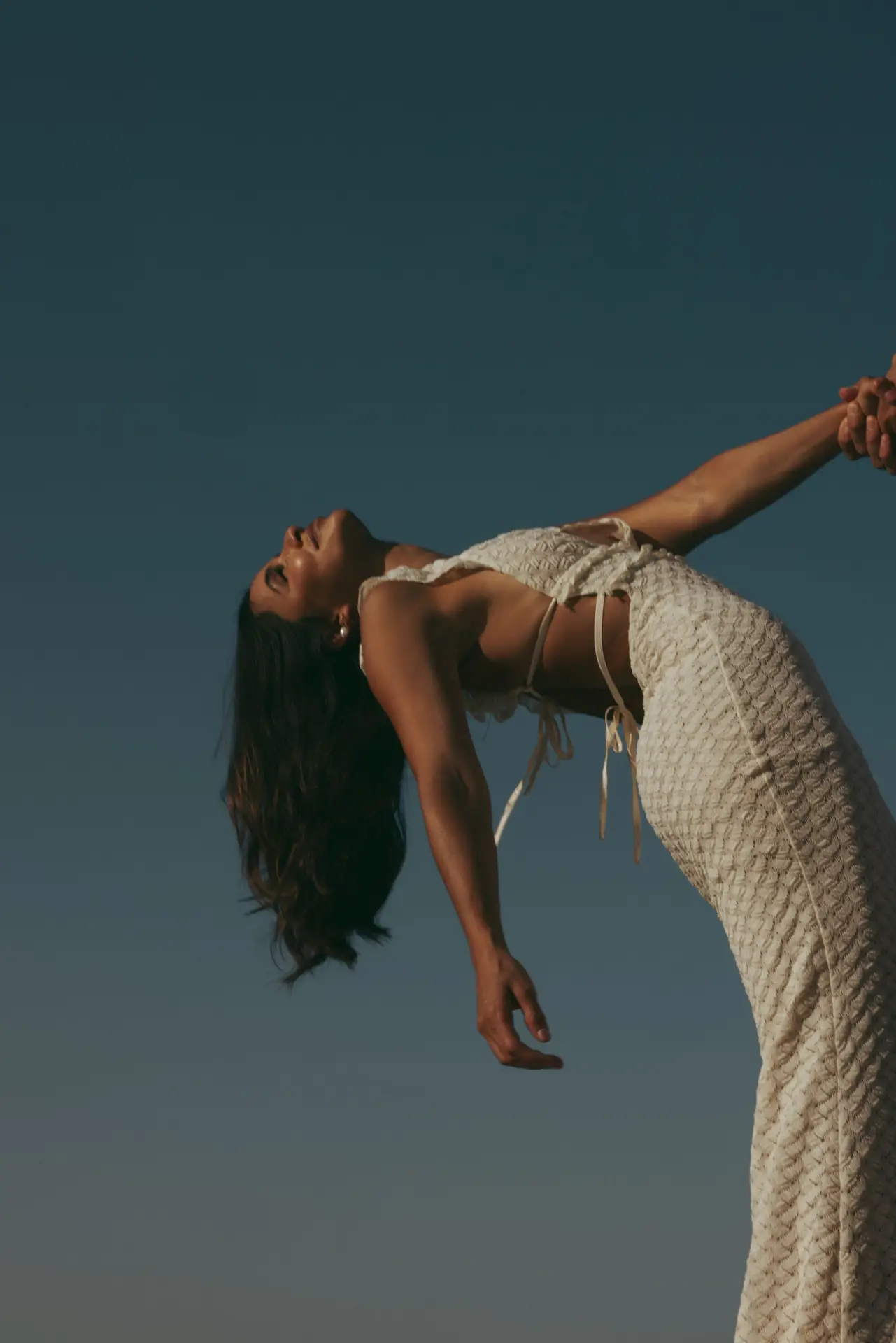 Bride thrashing her dress photo taken by Ximena Zermeño Global Luxury Destination Wedding Photographer, ximenazermeno.com