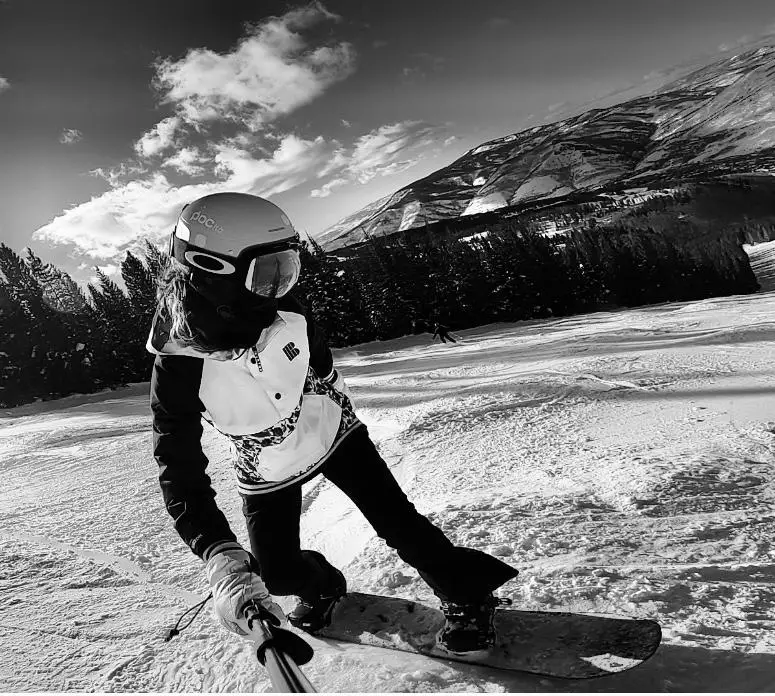 Xime snow boardingphoto taken by Ximena Zermeño Global Luxury Destination Wedding Photographer, ximenazermeno.com